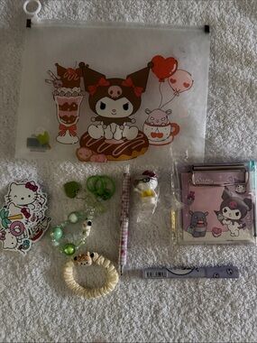 Sanrio Kuromi Clear Pouch with Brown and Pink Artwork and goodies inside